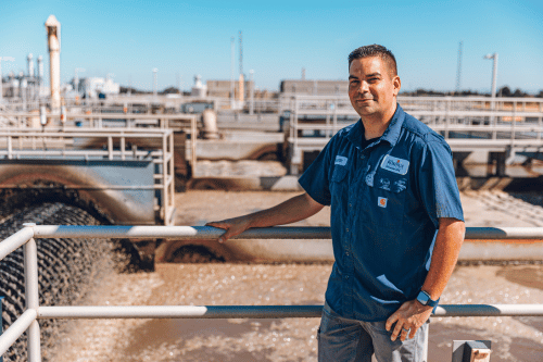 Man posing at our wastewater treatment plant